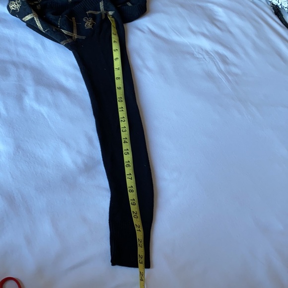 Black sweater with gold print in size small. - Picture 9 of 11